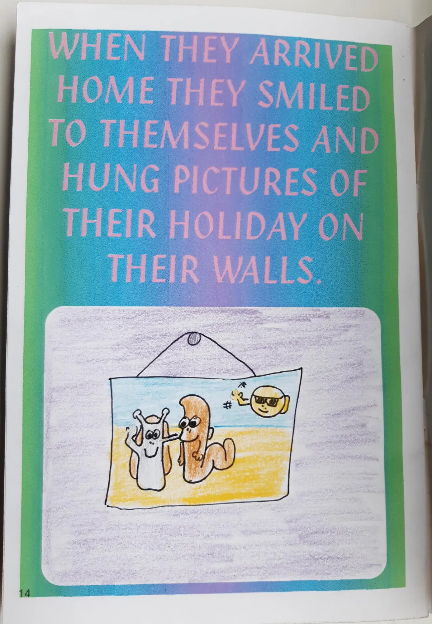 Page 14 of 16 of Alex’s school book. When they arrived home they smiled to themselves and hung pictures of their holiday on their walls. Drawing: A framed holiday picture on the wall.